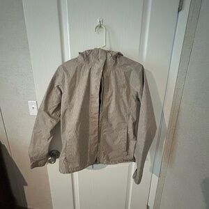 Tan North Face light weight rain jacket
